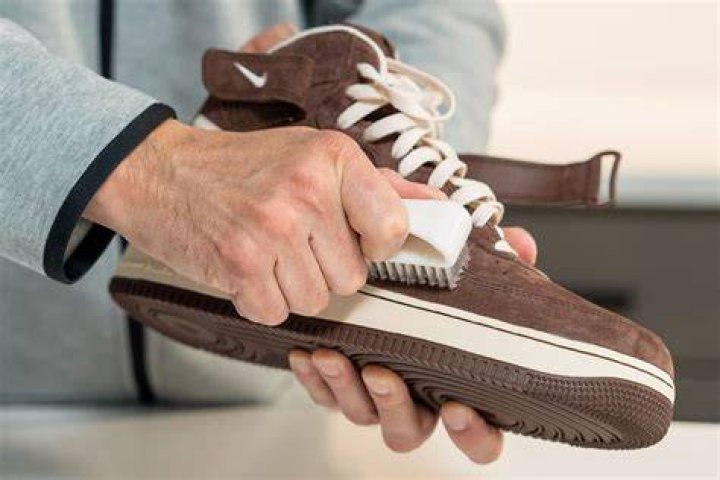 Can I clean suede with water?