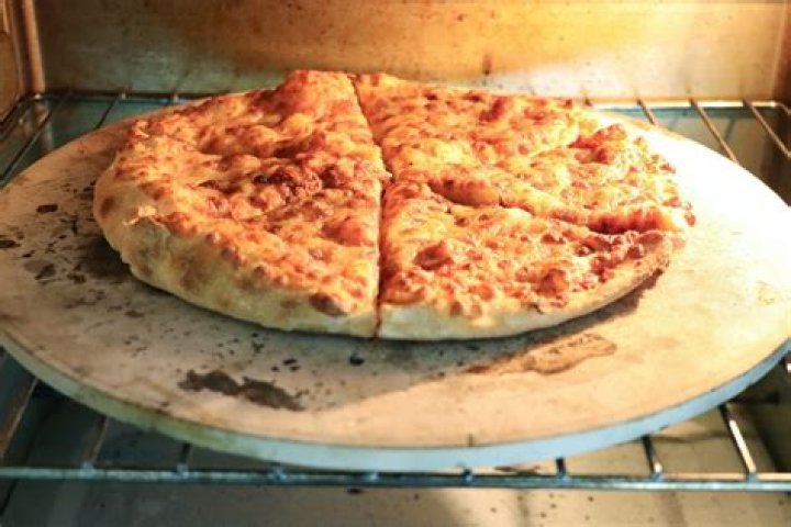 Does a pizza stone make crust crispy?