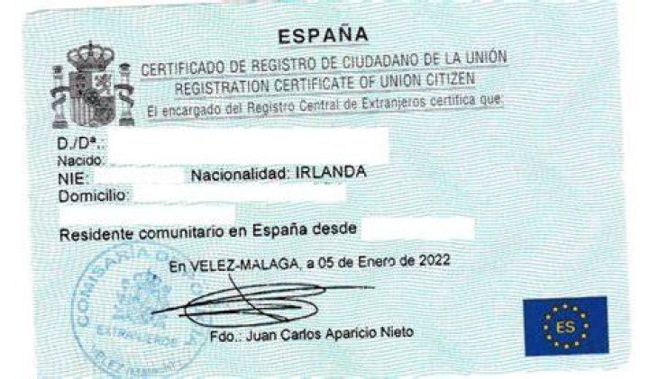 How do I become a resident of Spain in 2021?