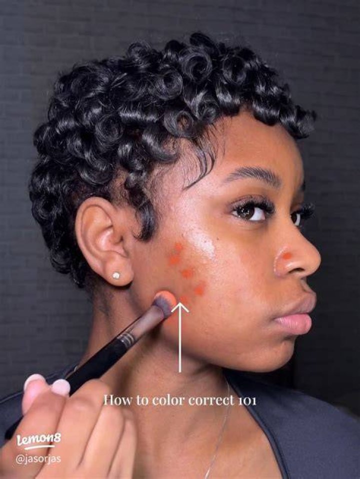 How do you cover dark spots with foundation?