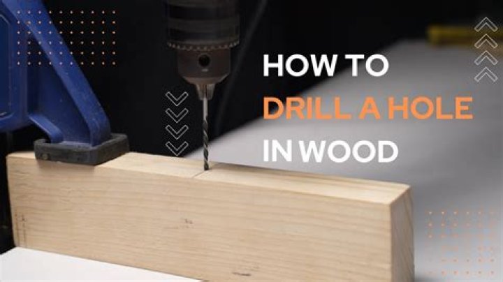 How do you drill through wood walls?