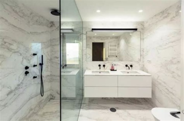 Is marble cheaper than tile?