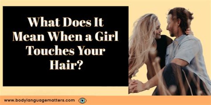 What does caressing your hair mean?