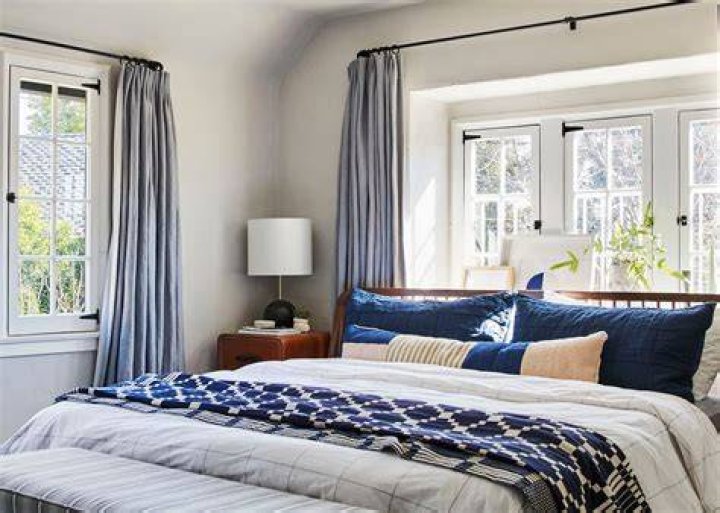 Why do designers put beds in front of windows?