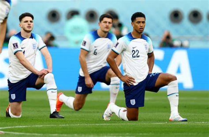 Why do footballers pull one leg of their shorts up?